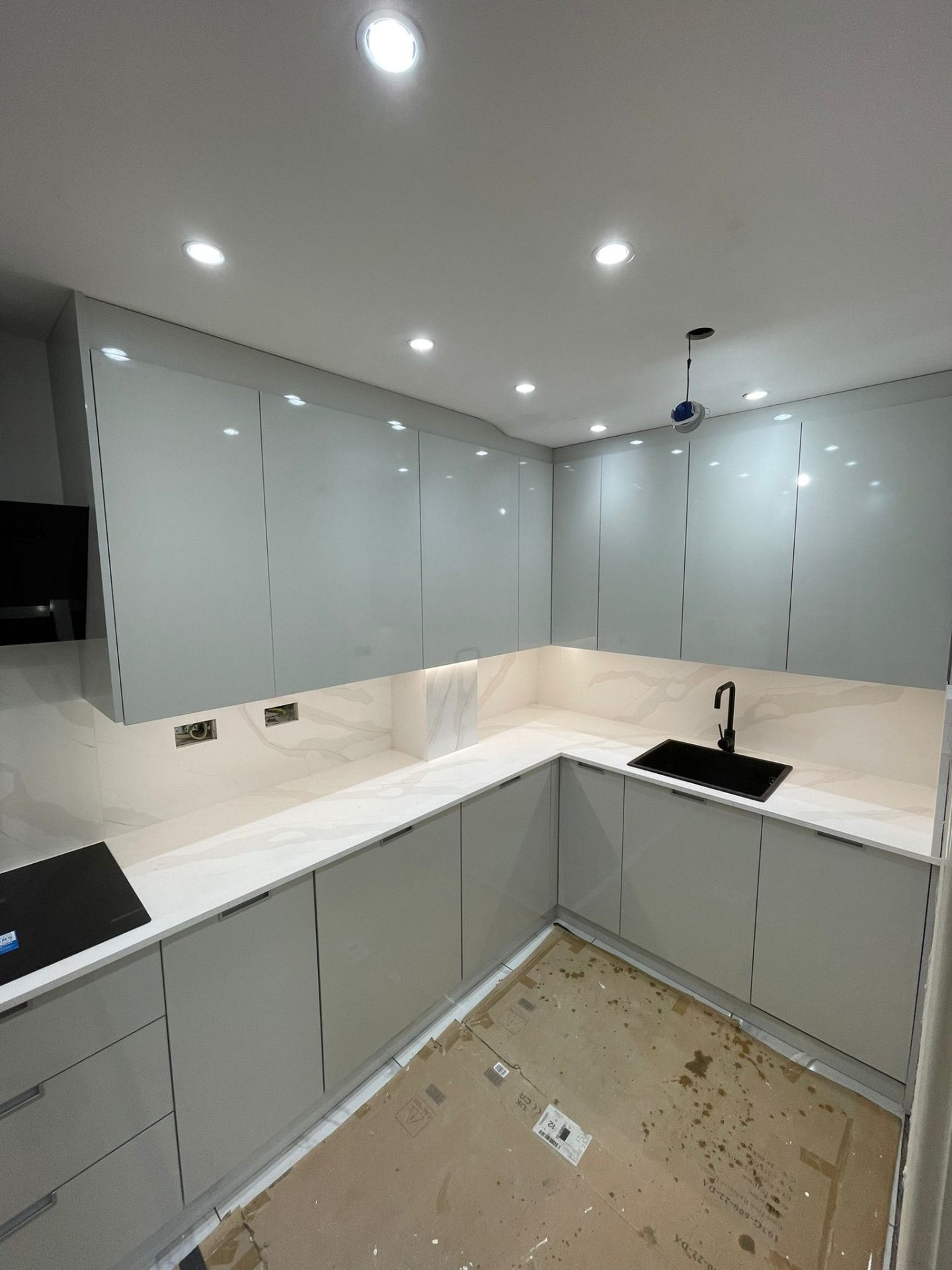 Bespoke kitchen worktop detail showing undermount sink and tap