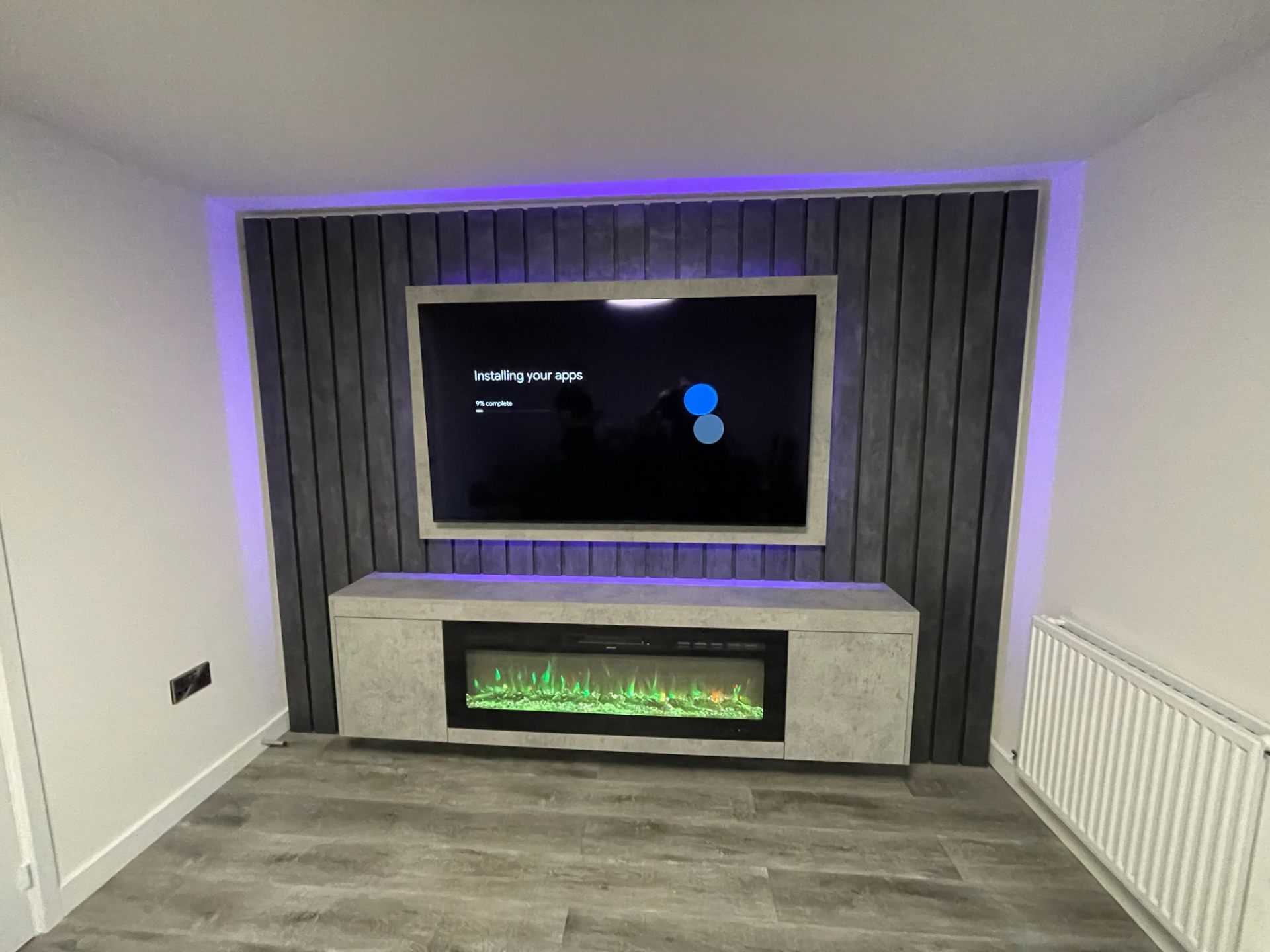 Wide media wall installation with colour-changing LED lighting