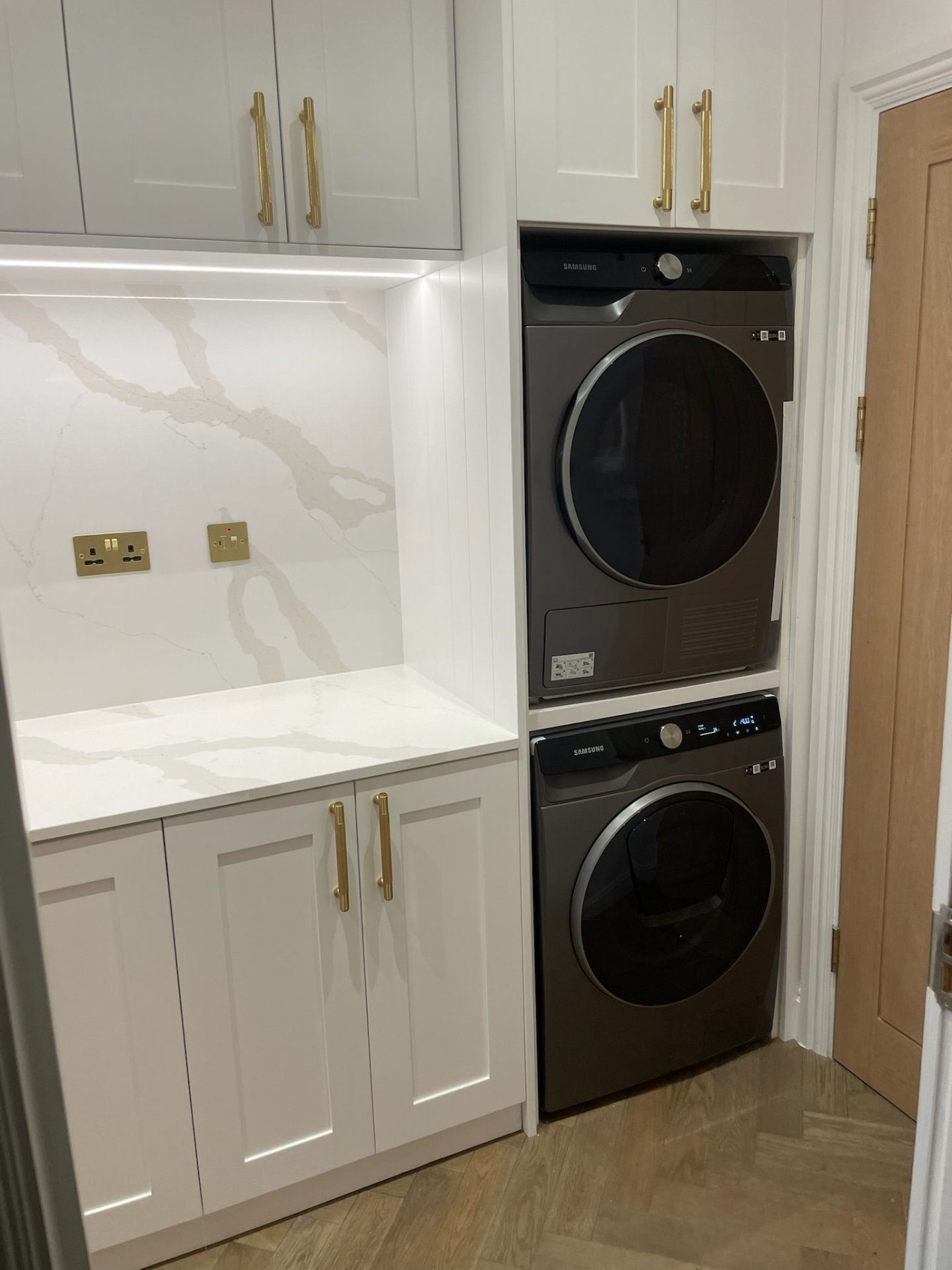 Close-up of utility room drawer and cupboard storage